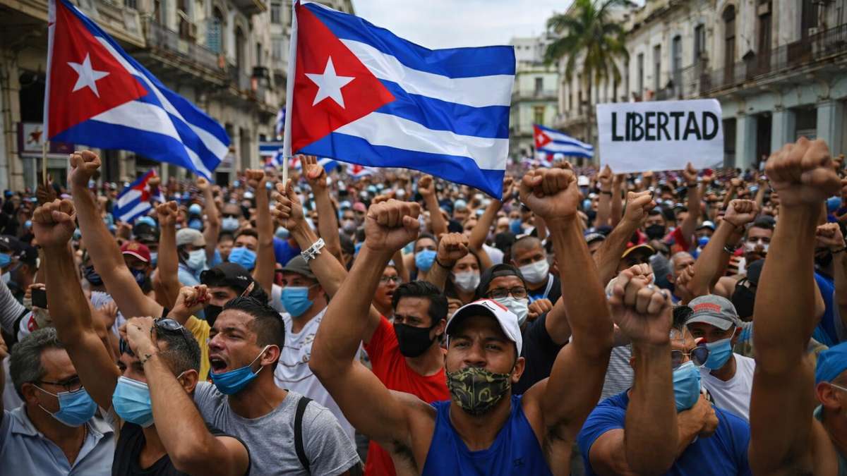 Protestors in Cuba demonstrating against food shortages and power outages