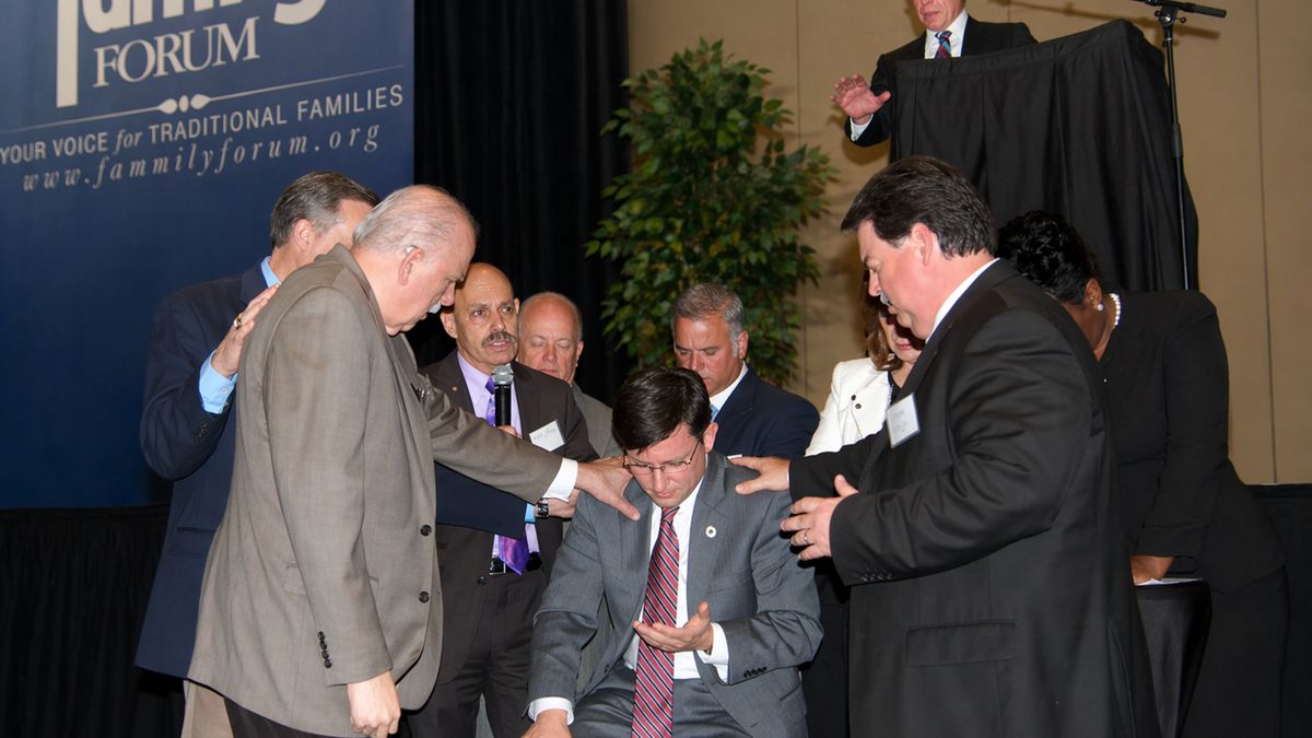 AI illustration of Mike Johnson at Prayer Breakfast, Baton Rouge, 2019